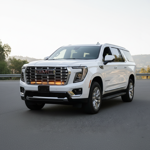 2025 white gmc yukon with led light bars behind grille for off roading