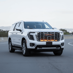 2025 2026 GMC Yukon with slim dual 40s light bars mounted under GMC grille on front bumper