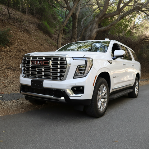 2025 white gmc yukon with led light bars behind grille for off roading