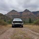 2024+ Ford F150 LightBar installed on truck in off-road setting with mountains in background.