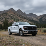 2024+ Ford F150 LightBar showcased on off-road terrain with mountains, highlighting non-modular bumper and stylish design.