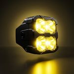 40W LED light pod lit in yellow, angled studio product photo with four lenses
