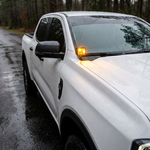 White Ford Ranger fitted with hood-mounted LED ditch lights, spot beam pattern