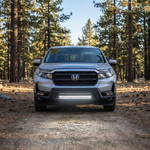 2021-2026 Honda Ridgeline at dusk on a forest trail with the 30in SLIM light bar lit white, beam lighting the ground ahead