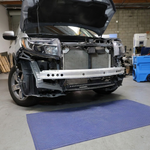 2021-2026 Honda Ridgeline with front bumper and grille removed showing the 30in SLIM light bar bolted to the factory bumper beam during install