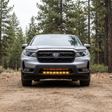 2021-2026 Honda Ridgeline straight-on front with amber DRL backglow running the length of the 30in PRO light bar