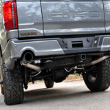2021 Ford F-150 Tremor reverse light close-up, 20W PRO pod and powder coated bracket bolted under the rear bumper
