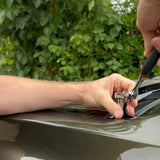 Installation of hood mount ditch lights on a 2024 Ford Ranger Raptor, showcasing hand tools and detailed work.