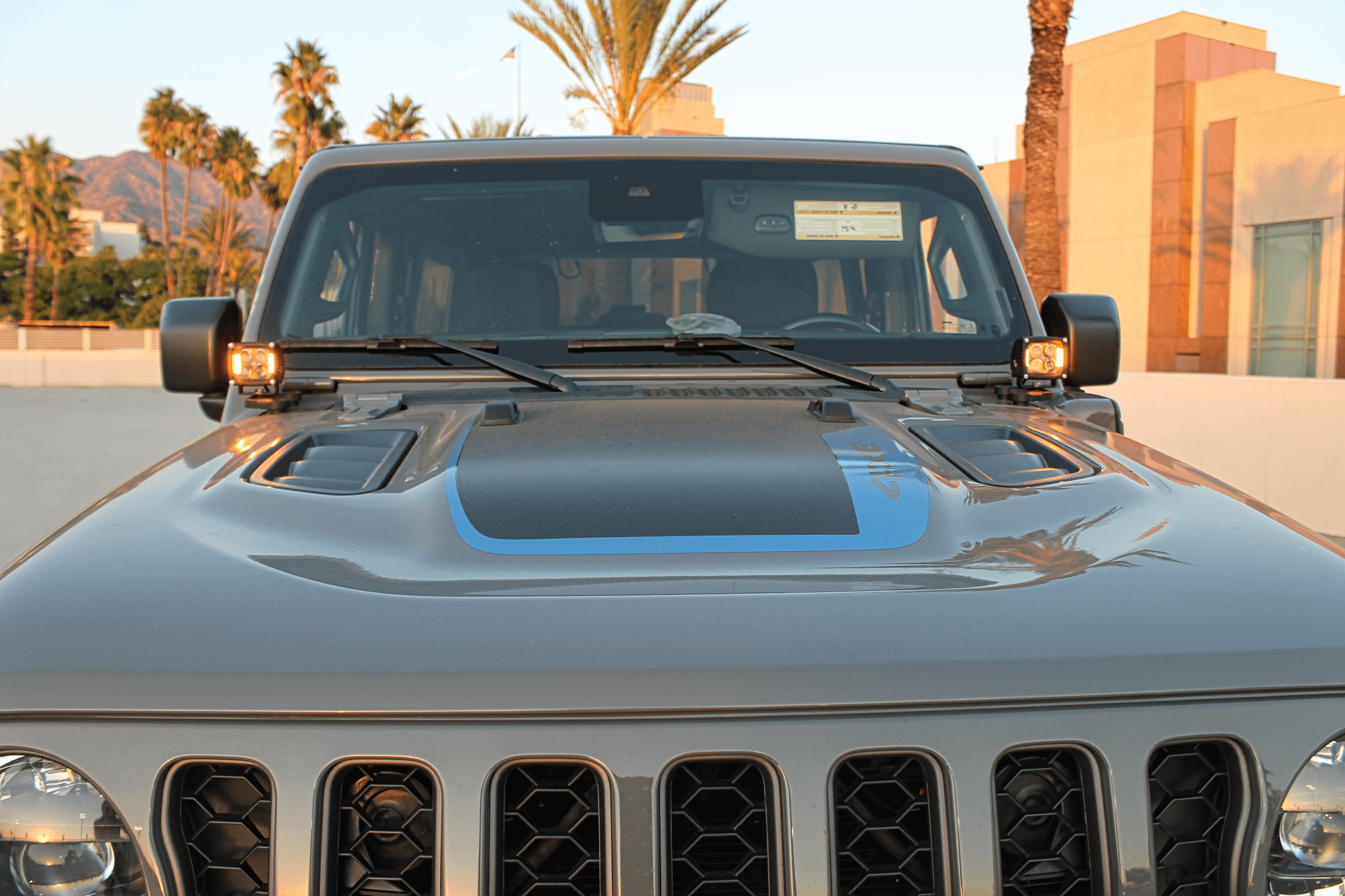 Jeep Wrangler ditch lights for JL 2017+ — two light pods included; dual-function LED white and amber lights on a JL Wrangler with / without mount brackets