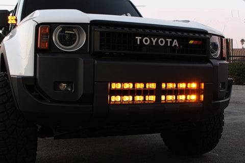 Land Cruiser ditch lights PRO on 2024+ Toyota Land Cruiser with amber DRL backglow front bumper lights
