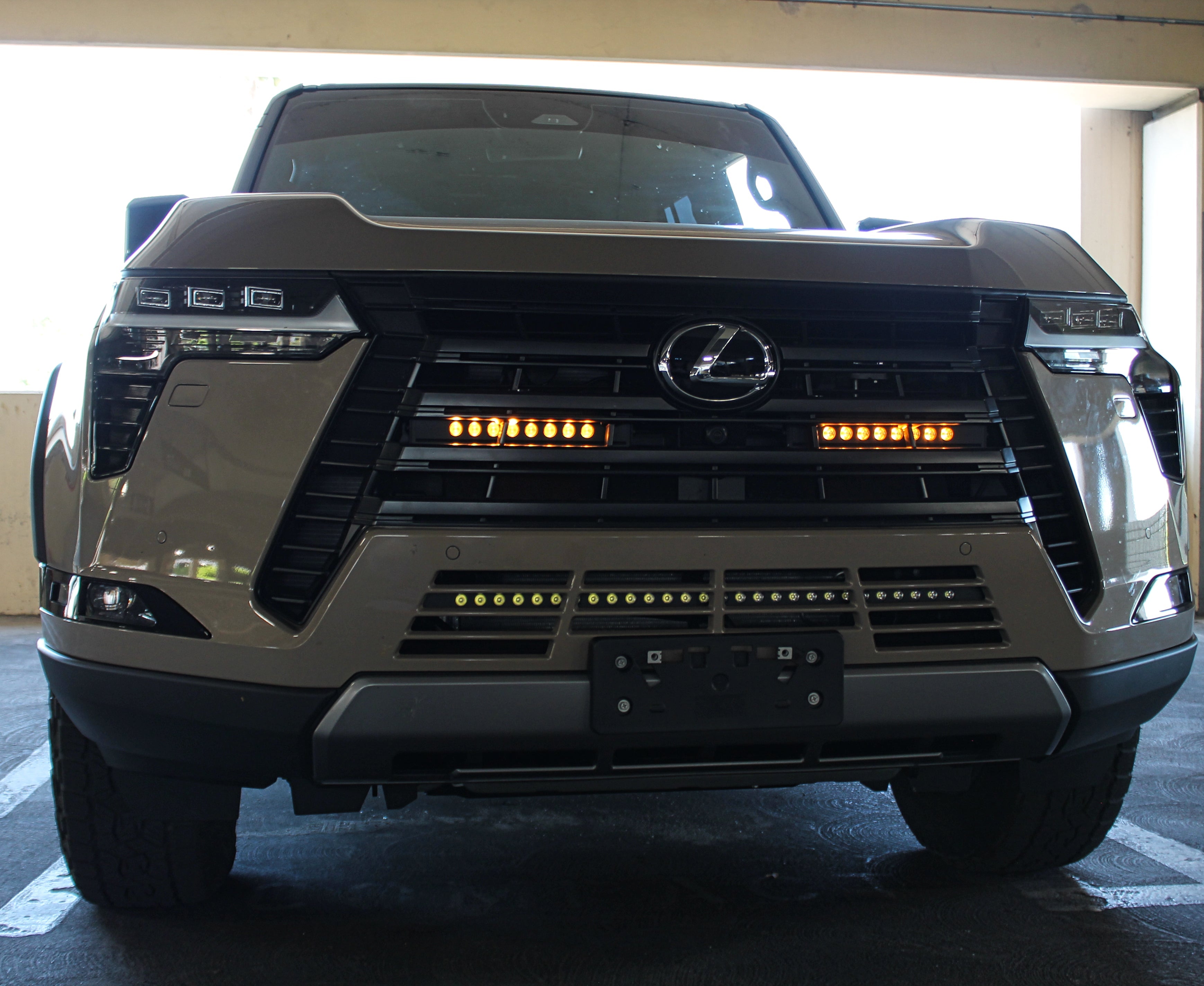 Lexus GX550 light bar for 2024+ models on front grille with dual bars and amber LEDs