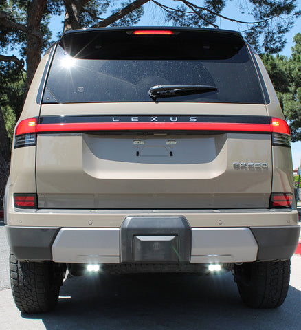 Lexus GX550 Reverse light kit product focus: Lexus GX550 Reverse light kit for 2024+ models - pair of pods with white LED and amber or red backlight option shown on 2024-2026 GX550 Premium/Luxury/Overtrail