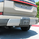 Lexus GX550 Reverse light kit image: rear of GX550 showcasing bumper and exhaust with hitch, suitable for 2024+ models