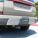 Lexus GX550 Reverse light kit image: rear of GX550 showcasing bumper and exhaust with hitch, suitable for 2024+ models