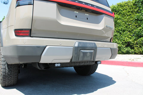 Lexus GX550 Reverse light kit image: rear of GX550 showcasing bumper and exhaust with hitch, suitable for 2024+ models