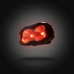 M&R Automotive reverse light LED pod with red backlight illuminated, angled view of dual round lenses