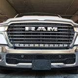white 2025 ram 1500 with LED light bar on top bumper and fog lights