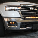 white 2025 ram 1500 with LED light bar ambeer drl and fog lights ambeer backglow