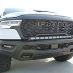 RAM RHO Ditch Lights on RAM 1500 PRO 2025+ front view with dual-color white LED and amber DRL backglow