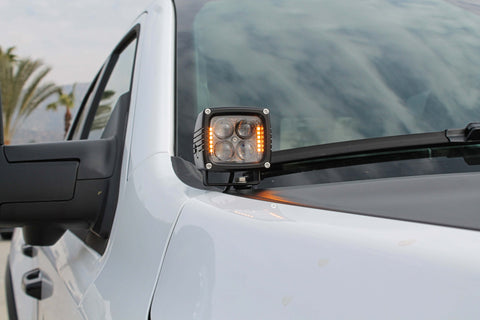 RAM RHO Ditch Lights Dual Color on 2025 RAM 1500 with amber DRL backglow, white LED main light for enhanced visibility