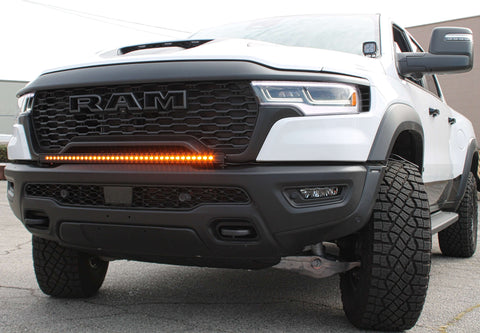 RAM RHO Ditch Lights on 2025+ RAM 1500 with dual color amber backglow and white LED, highlighting RAM RHO Ditch Lights feature