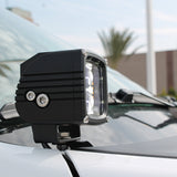 RAM RHO Ditch Lights Dual Color with white LED and amber DRL backglow on a RAM 1500 2025+ vehicle