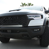 RAM RHO Ditch Lights show on 2025+ RAM 1500 with dual color white LED and amber DRL backglow, rugged front view