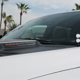 RAM RHO Ditch Lights on a RAM 1500 2025+ - dual color white LED with amber DRL backglow on hood