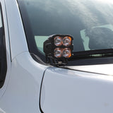 RAM RHO Ditch Lights - PRO 2025+ on white RAM 1500 with dual color amber DRL backglow