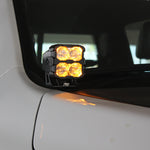 RAM RHO Ditch Lights - PRO 2025+ RAM RHO Ditch Lights on white truck with dual white and amber DRL glow