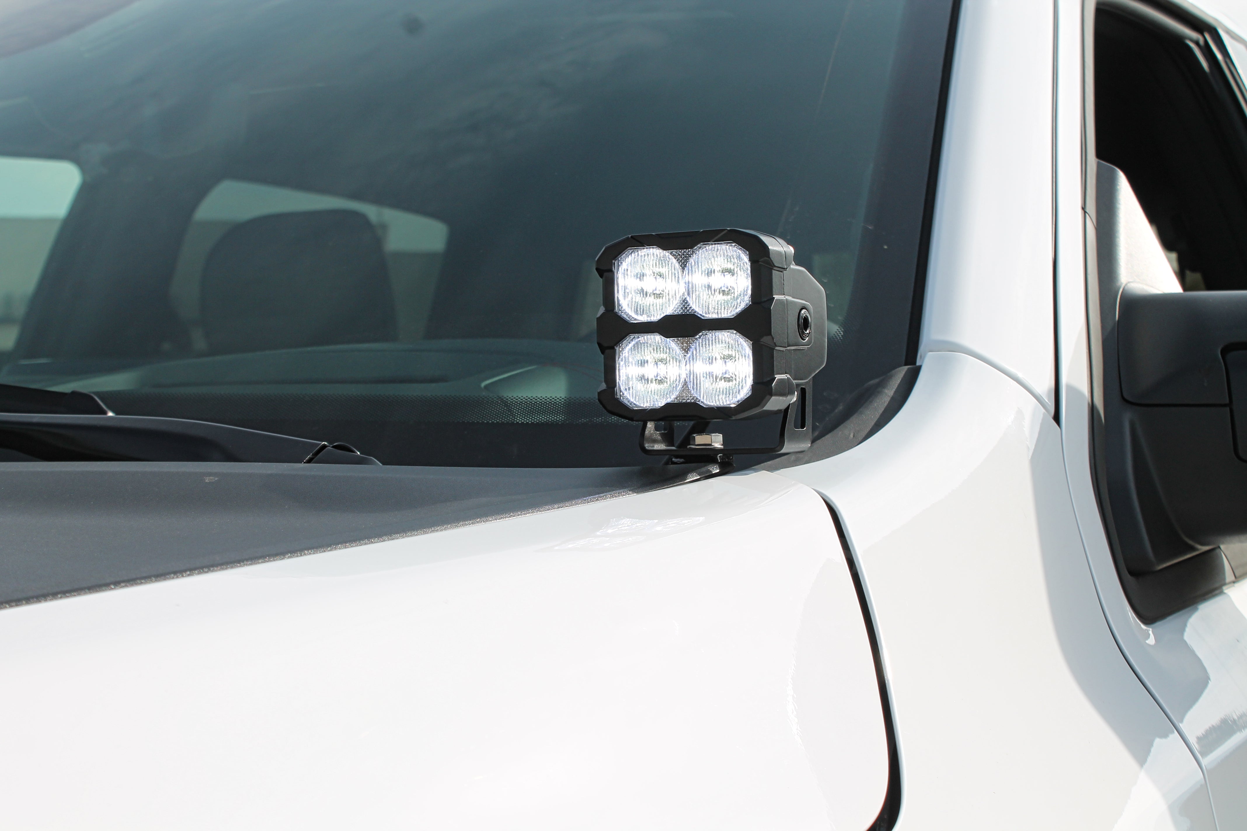 RAM RHO Ditch Lights - PRO 2025+ on 2025 RAM 1500 with dual color white LED and amber DRL backglow for enhanced visibility