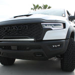 RAM RHO Lightbar on 2025+ RAM 1500 RHO — curved, slim front LED lightbar following bumper curvature, black powder-coated bracket, no drilling