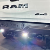 RAM RHO REVERSE Reverse Light Kit logo on RAM pickup, back view with dual white LEDs and amber/red backlight options