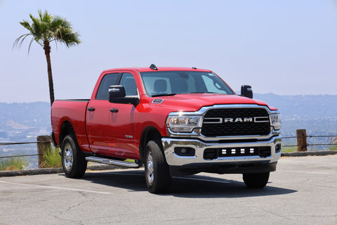 RAM 2500 lightbar Bumper Light kit installed on red 2019-2024 RAM 2500 truck with lower grille LED light pods