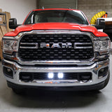 RAM 2500 lightbar Bumper Light kit installed on 2019-2024 RAM 2500 lower grille with bright LED light pods on