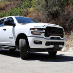 2025+ RAM 2500 light bar slim 40in curved LED installed on white RAM 2500 truck front grille, fits 2025 2026 RAM 2500 3500 trims