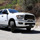 2025+ RAM 2500 light bar slim 40in curved LED installed on white RAM 2500 truck front grille, fits 2025 2026 RAM 2500 3500 trims