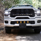 2025+ RAM 2500 Light kit lower grille LED pod lights installed on white RAM 2500 truck front view