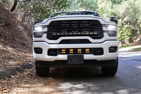 2025+ RAM 2500 Light kit lower grille LED pod lights installed on white RAM 2500 truck front view