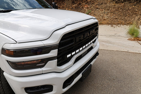 2025+ RAM 2500 light bar PRO 40in curved LED grille mount on white RAM 2500 truck front view for 2025 2026 models
