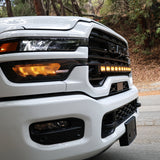 2025+ RAM 2500 light bar 40in PRO curved LED installed on white 2025 RAM 2500 front grille