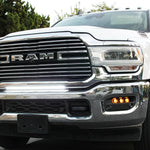 RAM 2500 Fog Light Kit installed on 2025 RAM 2500 truck with slotted fog light bezel and illuminated amber fog lights