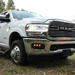 RAM 2500 Fog Light Kit installed on 2025 RAM 2500 truck showing upgraded amber fog lights in chrome front bumper