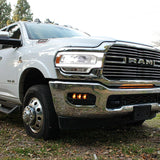 RAM 2500 Fog Light Kit installed on 2025 RAM 2500 truck showing upgraded amber fog lights in chrome front bumper
