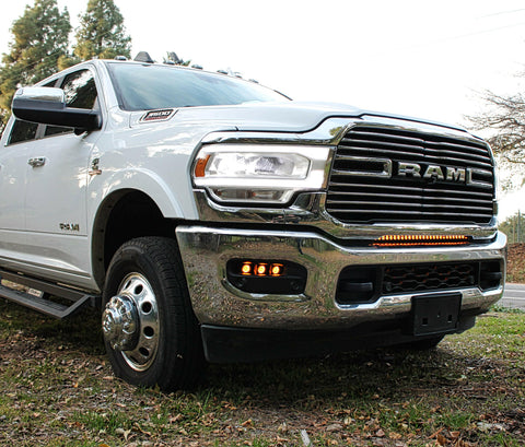 RAM 2500 Fog Light Kit installed on 2025 RAM 2500 truck showing upgraded amber fog lights in chrome front bumper