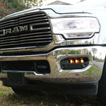 RAM 2500 Fog Light Kit installed on 2025 RAM 2500 front bumper with amber fog lights illuminated