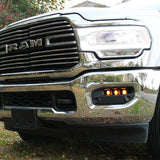 RAM 2500 Fog Light Kit installed on 2025 RAM 2500 front bumper with amber fog lights illuminated