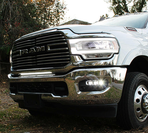 RAM 2500 Fog Light Kit installed on 2025 RAM 2500 truck front bumper with bright LED fog lights illuminated