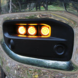RAM 2500 Fog Light Kit installed with three amber LED fog lights on chrome front bumper