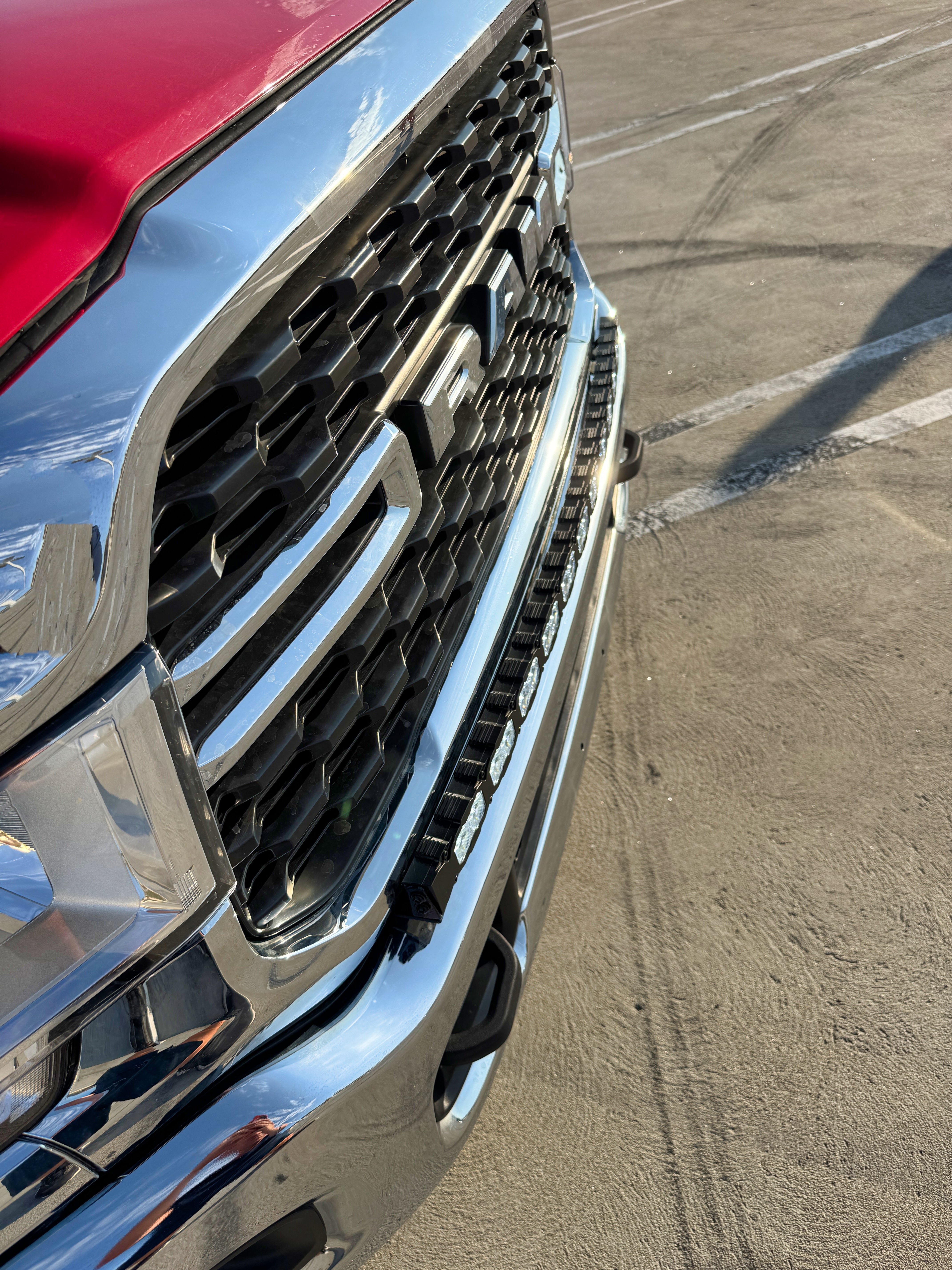 RAM 2500 3500 HD 40in Light Bar PRO curved LED installed flush in chrome front bumper and grille, 2019-2024 RAM truck